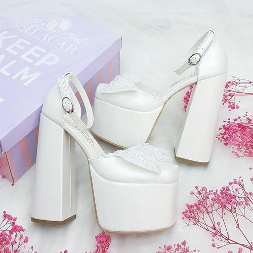 Very Comfortable Bridal Shoes with Slightly Curved Bow Detail and 16 Inch High Heels